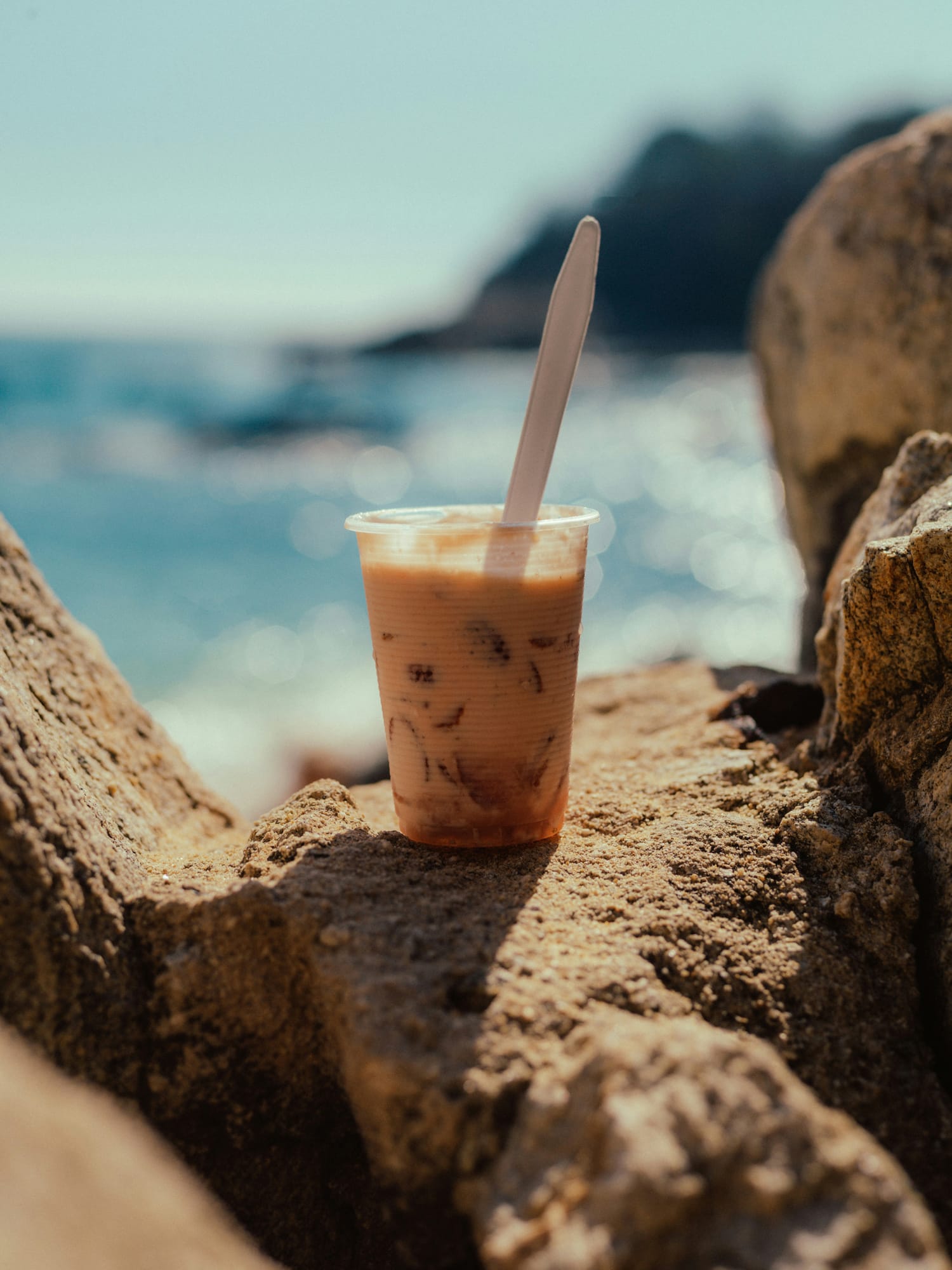 Ice coffee in a single-use plastic cup