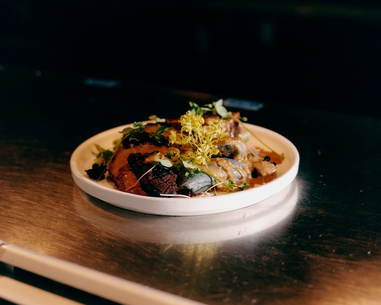 Duck breast with maple pepita dressing ready to be served