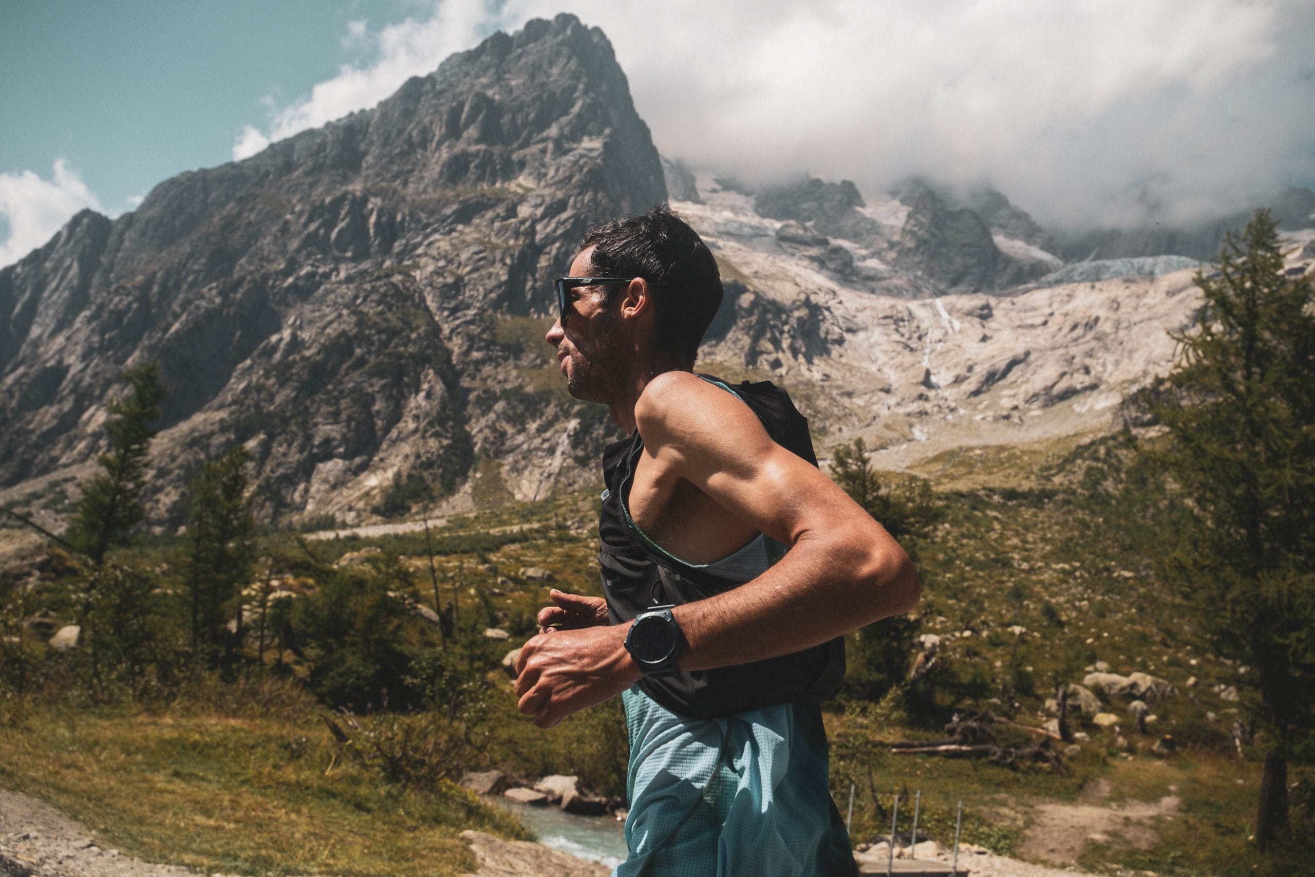 Kilian Jornet at the foot of a glacier in the Mont Blanc area